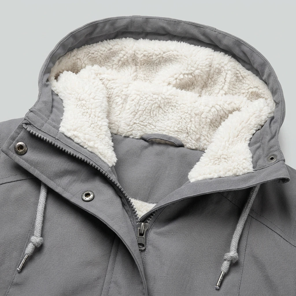 Close-up of the hood lining and collar detail on the grey Isla Hooded Pleated Parka Coat