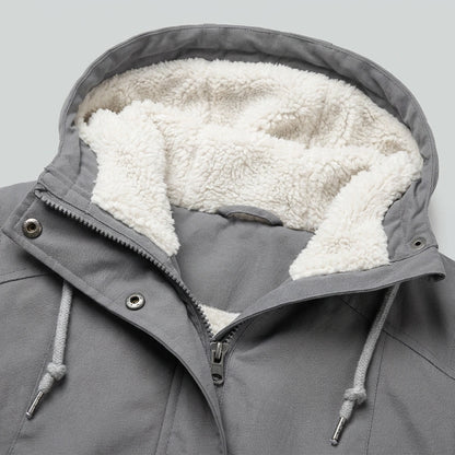 Close-up of the hood lining and collar detail on the grey Isla Hooded Pleated Parka Coat