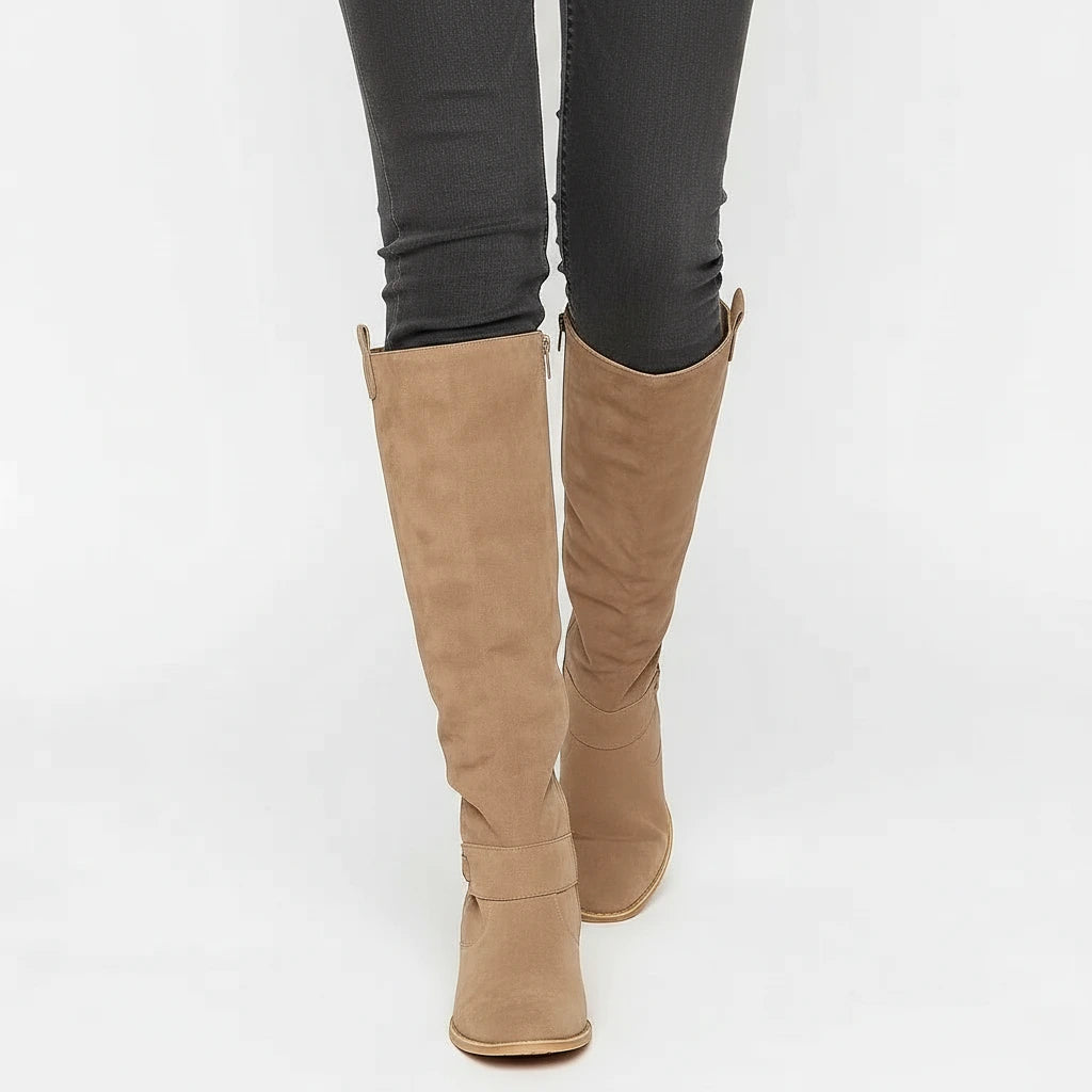 Valelus Ivy Suede Knee-High Boots in Beige, side walking view on model
