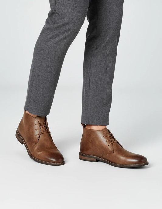 Valelus Muhammad Full-Grain Leather Chukka Boots in Dark Brown, side walking view on model