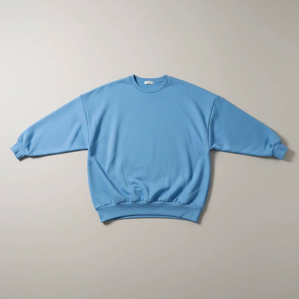 Nora Oversized Textured Sweater in blue, flat lay product photo