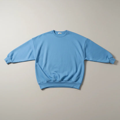 Nora Oversized Textured Sweater in blue, flat lay product photo