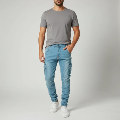 Ultra-Stretch Slim Cargo Jeans in blue, worn on-model, full length front view
